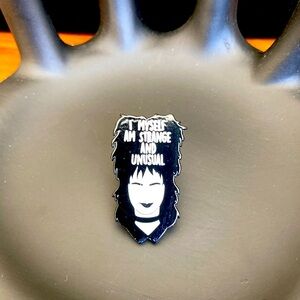 Lydia Strange and Unusual pin